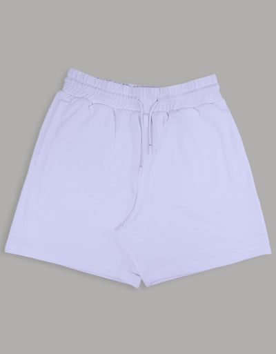 White laidback terry shorts with elastic waistband and drawstring, soft breathable fabric, unisex relaxed fit